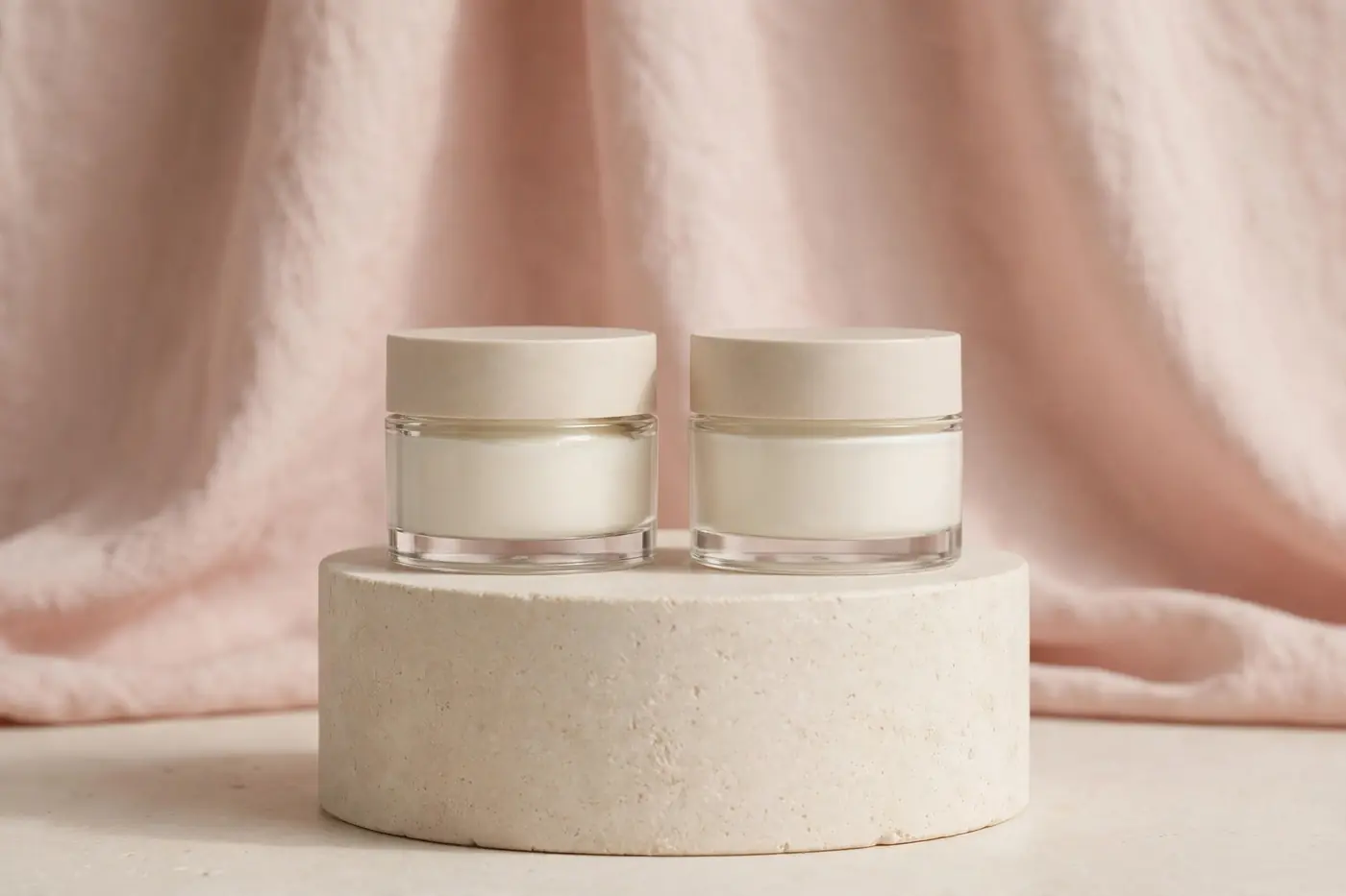 Illustrative photo: two moisturizer jars side by side representing a CeraVe vs Neutrogena comparison